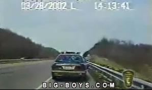 Police Officer Avoids Near Death Collission